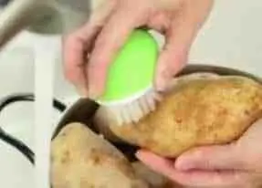 Scrub the potatoes thoroughly with a vegetable brush