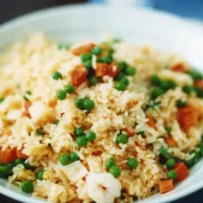 Simple rice recipe with green peas and red bell pepper